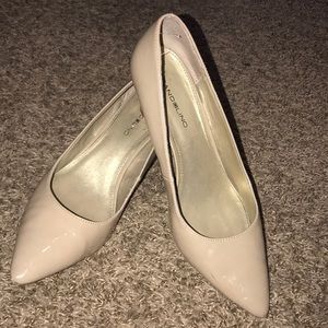 BANDOLINO three-inch nude beige heels.
